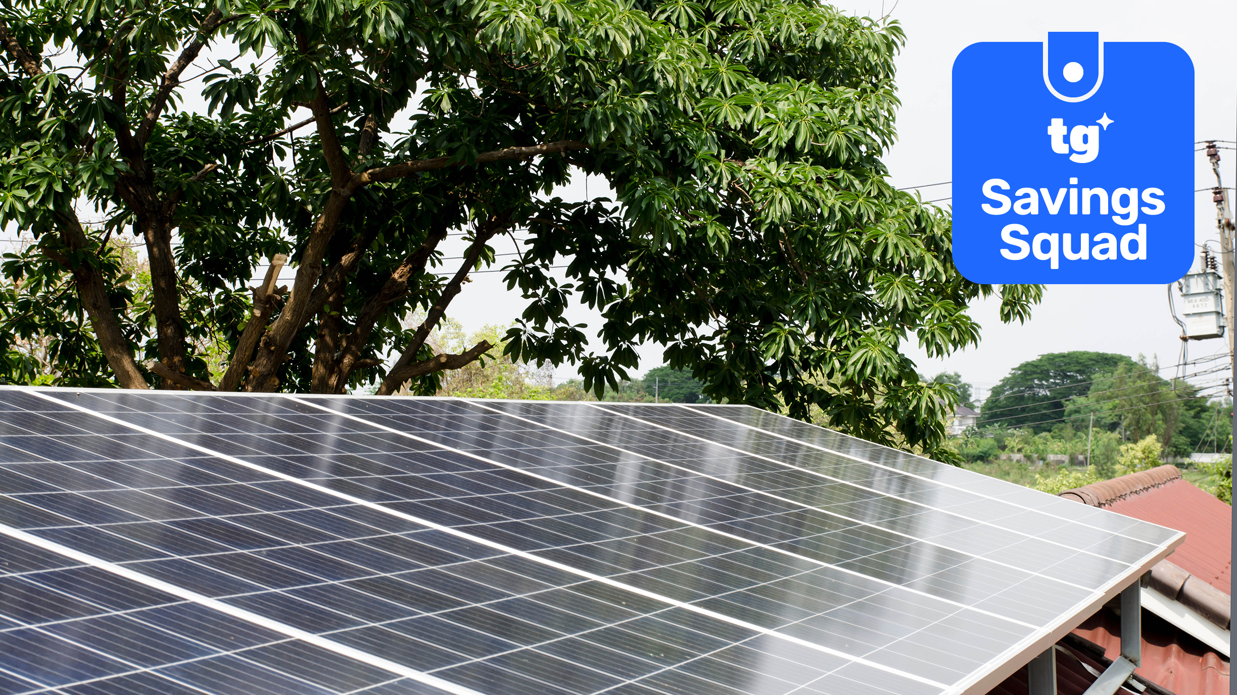solar panels on roof with savings squad badge