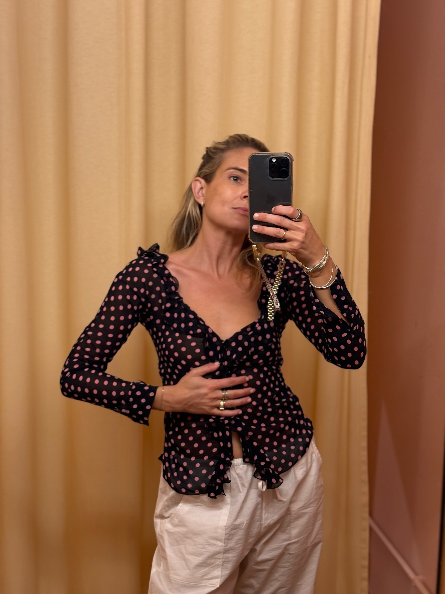 Woman wears pretty summer blouse