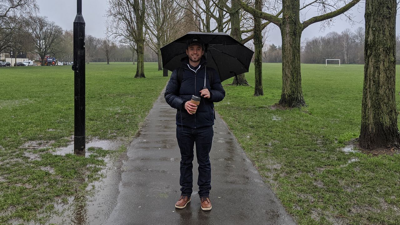 Man walking in the rain