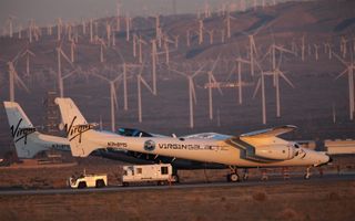 Virgin Galactic's carrier plane, the VMS Eve, is seen during preflight preparations for the first powered test flight of the VSS Unity space plane at the Mojave Air and Space Port in Mojave, California on April 5, 2018. The test flight did not aim to reach space.