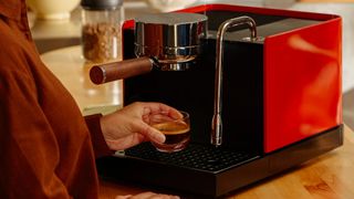 Person using Fellow Espresso Series 1 coffee machine