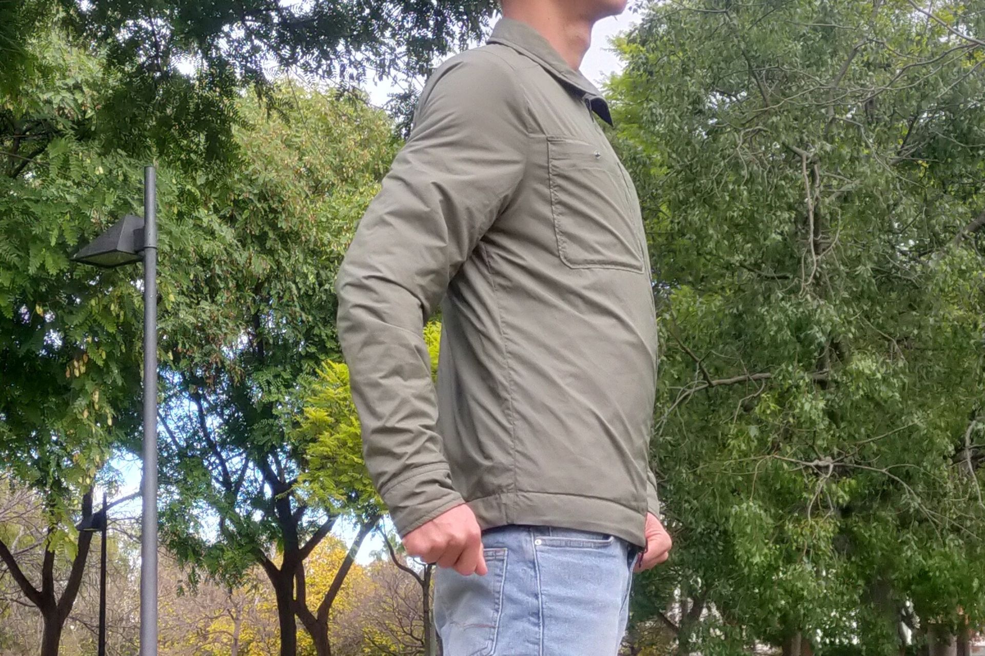 Image shows a rider wearing the Chrome Two Way Insulated Shacket