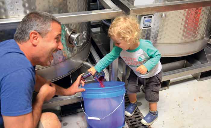 Kutch passes on his winemaking skills to his son Clayton