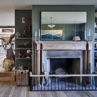large fireplace with metal and wood fire surround