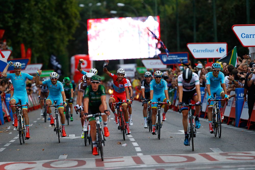 Fabio Aru salutes his overall win before crossing the Vuelta's stage 21 finish.