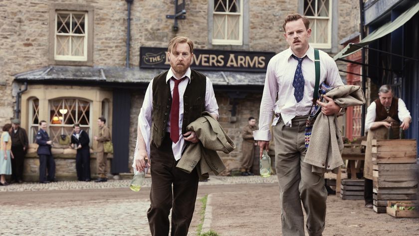 Samuel West in a shirt and waistcoat looking dishevelled and holding a bottle as Siegfried andCallum Woodhouse in a shirt holding a jacket as Tristan in All Creatures Great and Small.