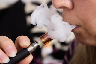 A person vaping.