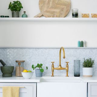 kitchen white wall with tiles on wall and sink