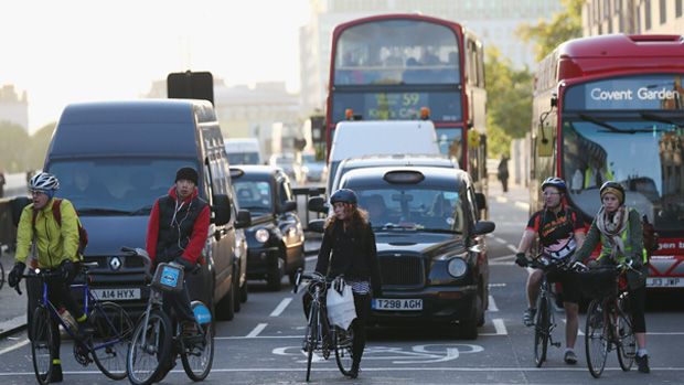 LONDON, ENGLAND - NOVEMBER 15:Cyclists negotiate rush hour traffic in central London near Waterloo Station on November 15, 2013 in London, England. Over the course of the past 10 days, five c