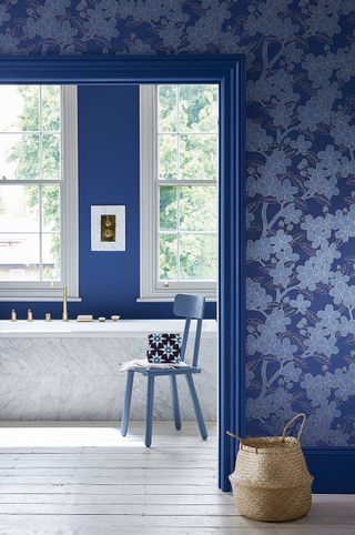 Blue floral wallpaper in a bathroom