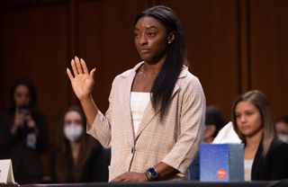 Olympic gymnast Simone Biles is sworn in to testify during a Senate Judiciary hearing