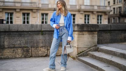 woman posing in jeans - best high street jeans