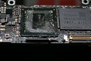 A Kirin 9000s chip fabricated in China by Semiconductor Manufacturing International Corp. (SMIC), inside a Huawei Technologies Co. Mate 60 Pro smartphone.
