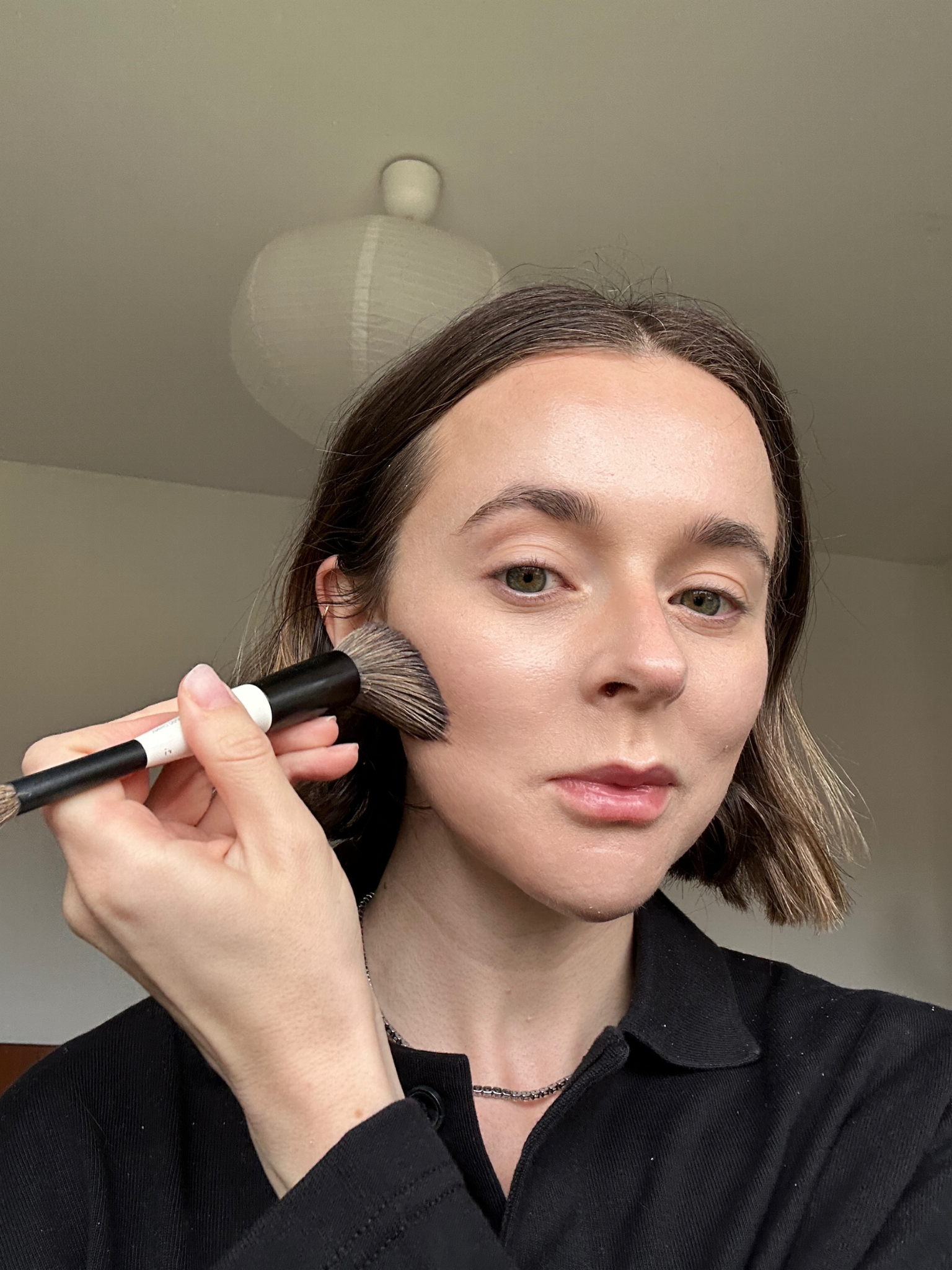 Freelance beauty editor Grace Day, wearing Makeup By Mario SoftSculpt Transforming Skin Enhancer