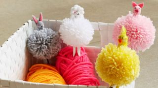 Image of handmade pom pom pegs in different colours