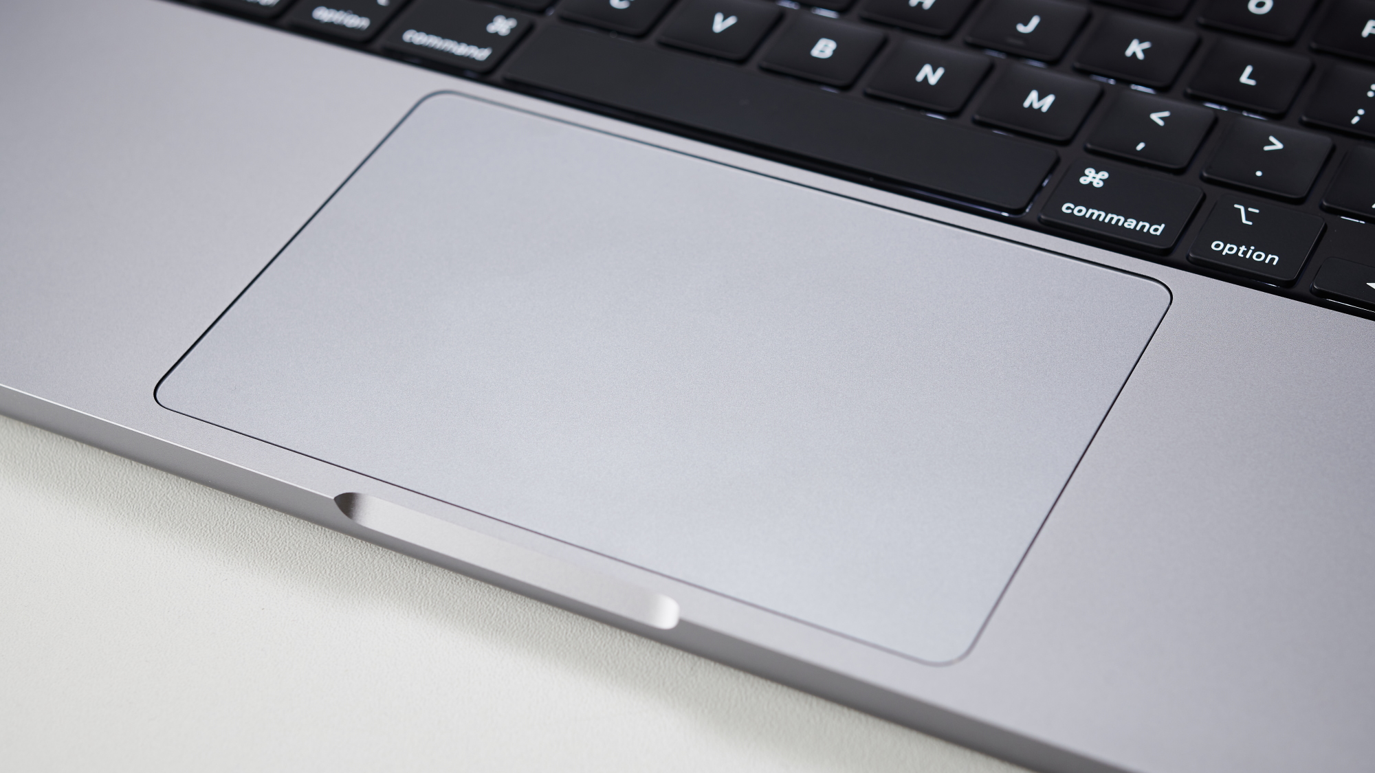 MacBook Pro 14-inch on a table in an office