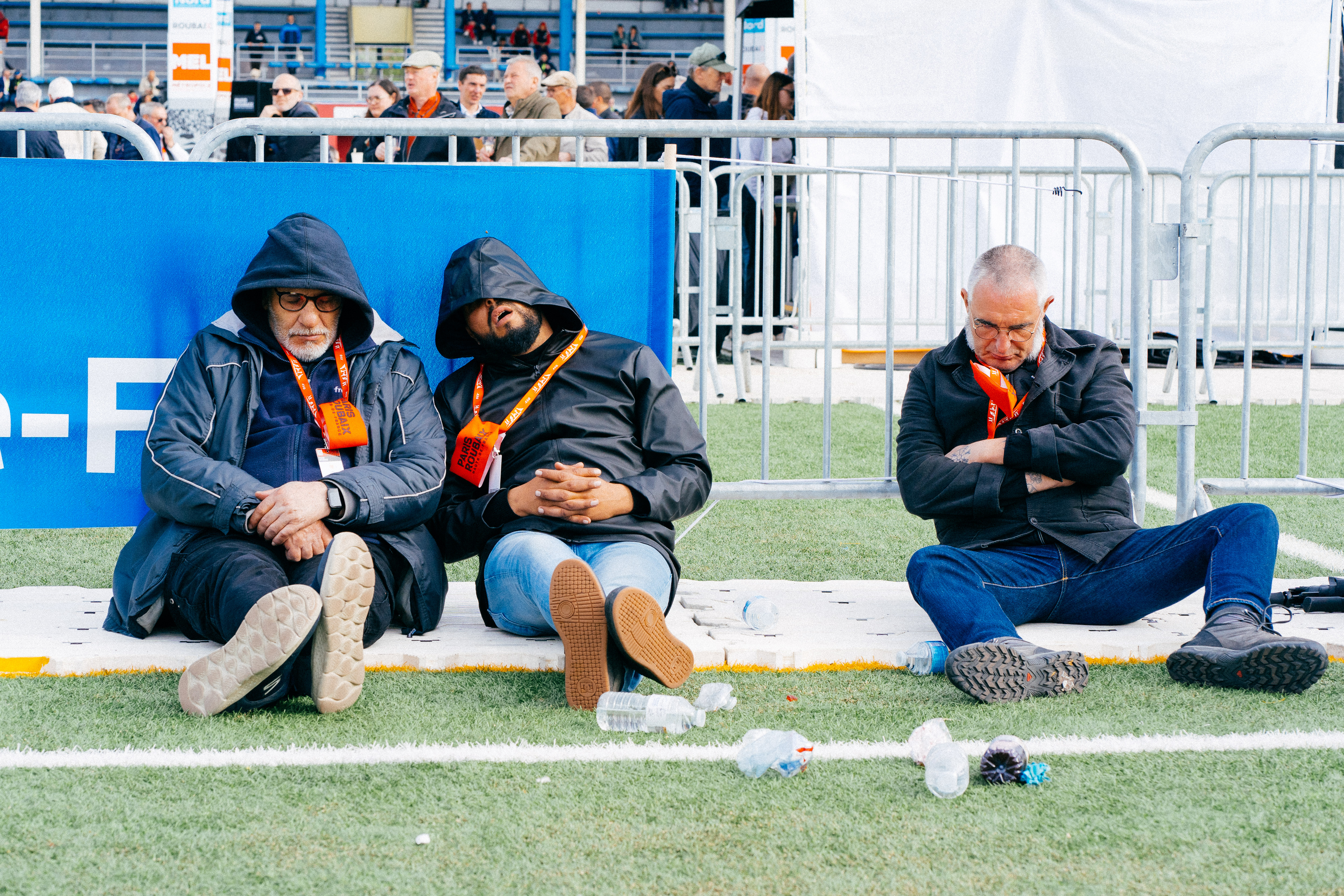 Paris-Roubaix staff sleep at the finish in the velodrome infield at Paris-Roubaix