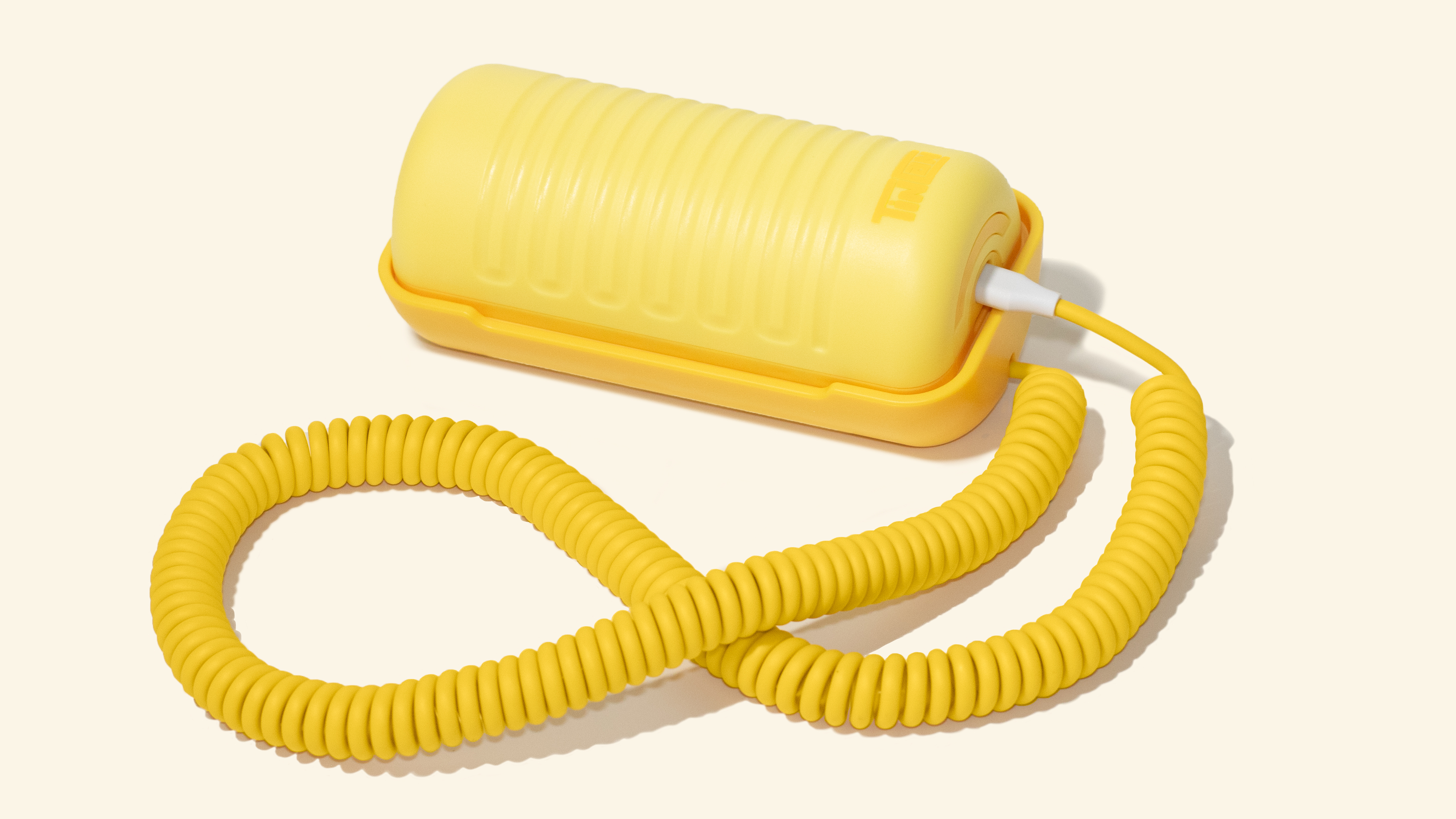 The Tin Can landline-inspired phone in a yellow "Landline Lemon" colorway