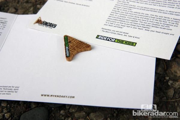 Professional rider Andreas Klier created MyKnoaky so that people would always have a bit of wood to knock on for luck. A new collaboration with I Ride for the Kids helps families cope with the challenges of a child who falls ill.