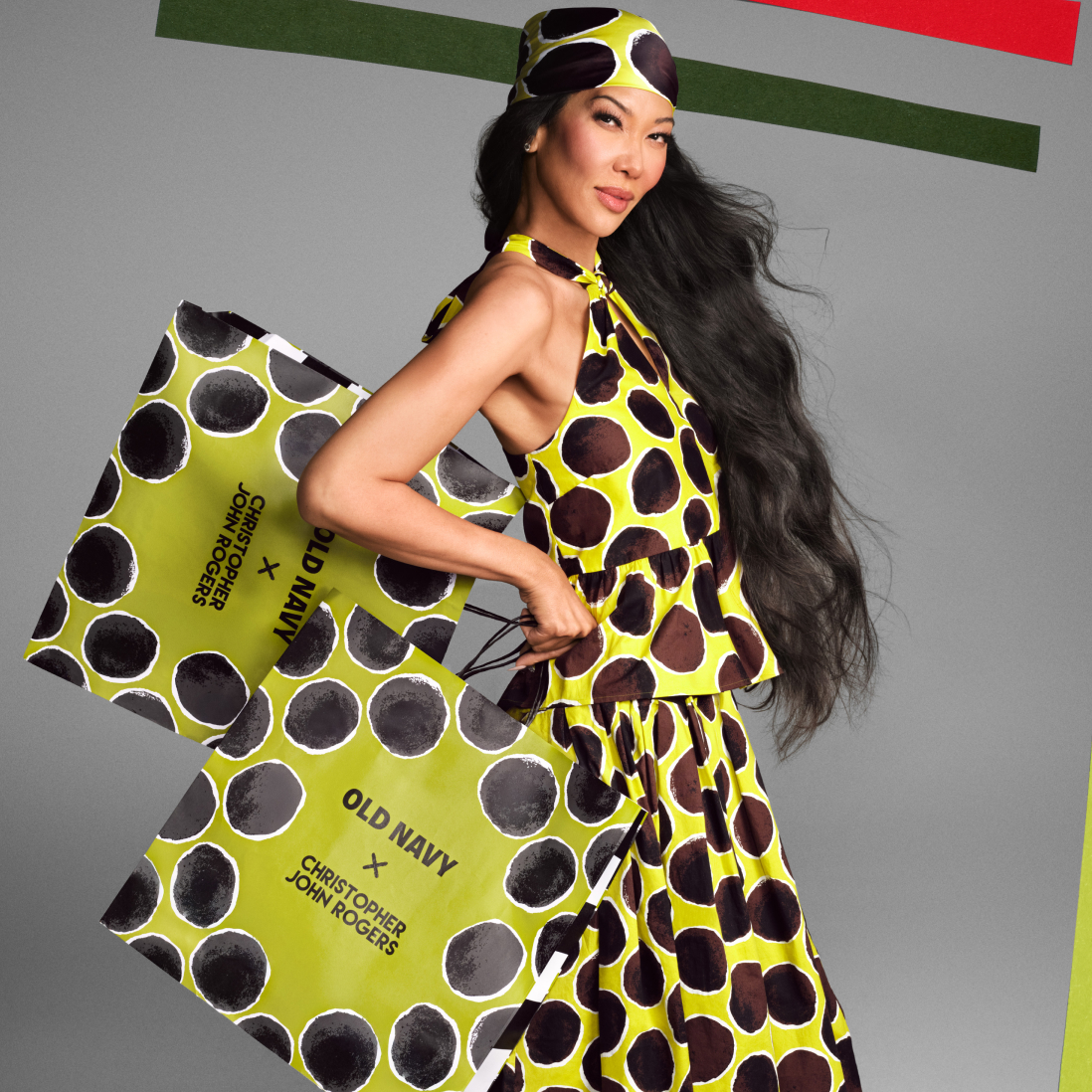 Kimora Lee wearing a green, brown, and black polka dot set from the Old Navy x Christopher John Rogers collaboration