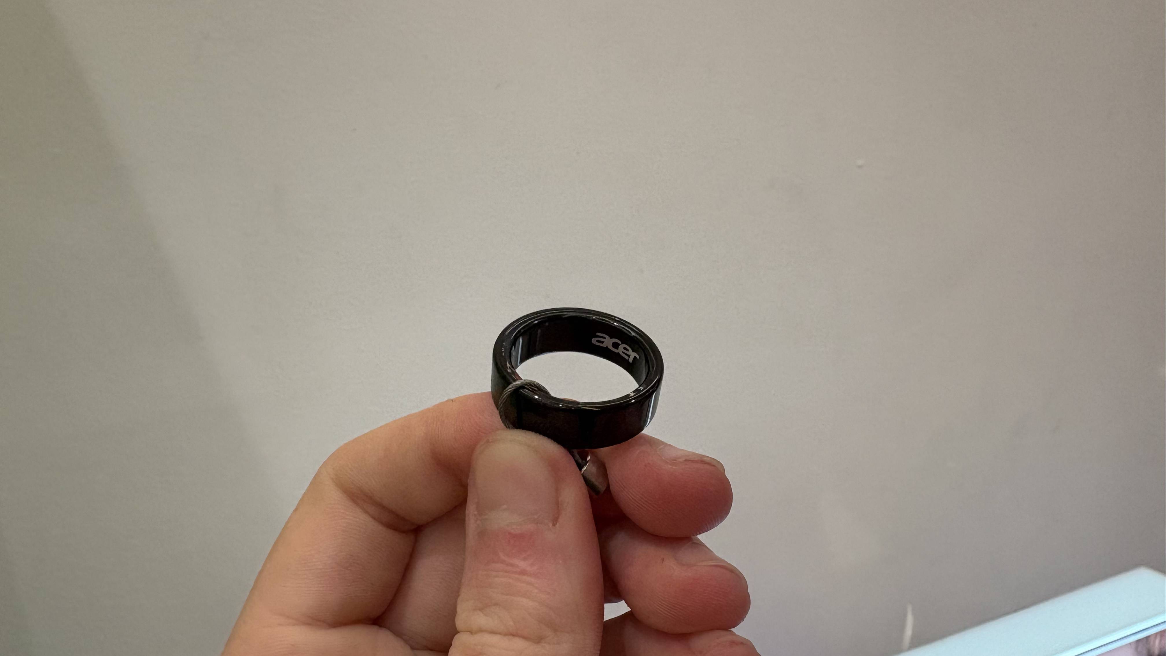 Acer FreeSense Ring in Black held with fingers