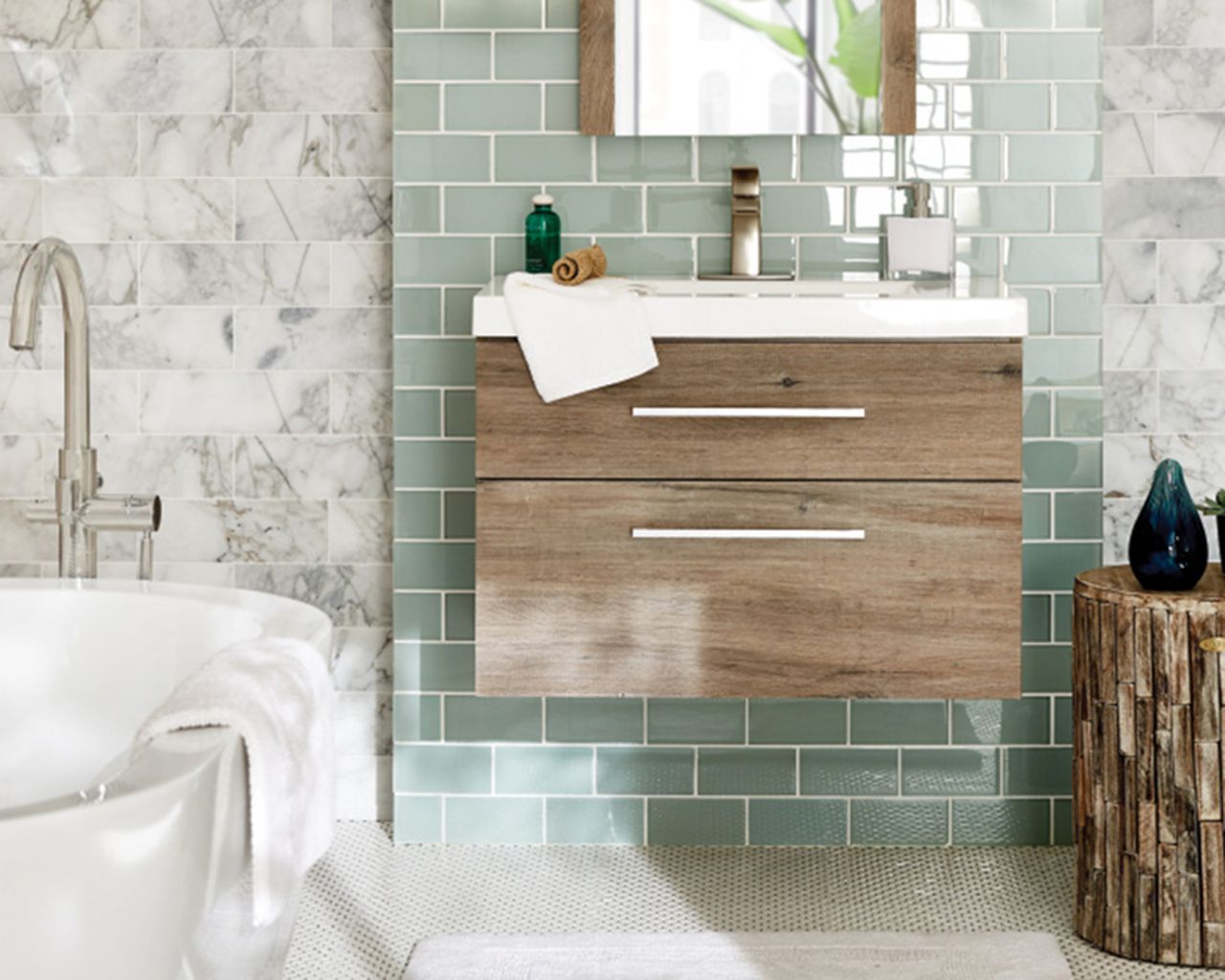 Bathroom with floating bathtub, tiled will and white bath