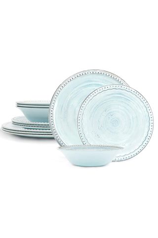 neutral dinnerware set with an embossed design