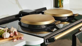 Aga hot plate with brass cover