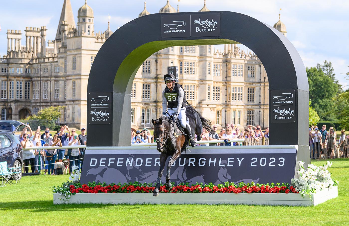 Tom Crisp and LIBERTY AND GLORY at the cross country phase, Defender Burghley Horse Trials 2023