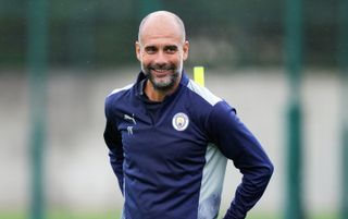 Manchester City manager Pep Guardiola smiling | Manchester City v RB Leipzig live stream