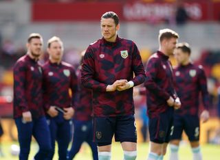 Burnley’s Wout Weghorst and team mates warming up prior to kick-off during the Premier League match at Brentford Community Stadium, London. Picture date: Saturday March 12, 2022