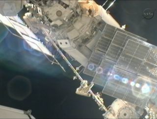 Cosmonauts move space station crane on Aug. 20, 2012 spacewalk.