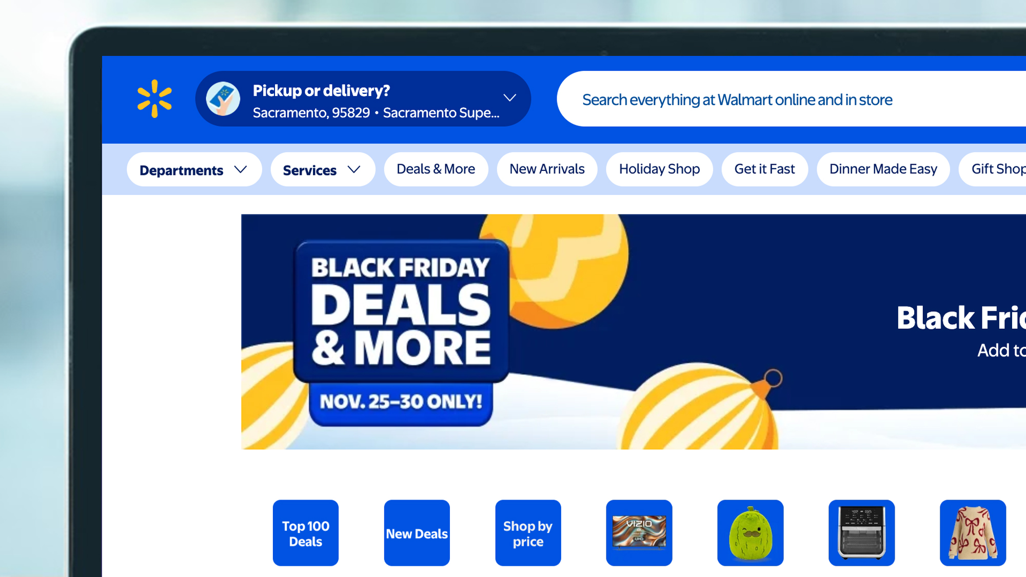 A laptop screen showing the Walmart homepage during Black Friday 2025