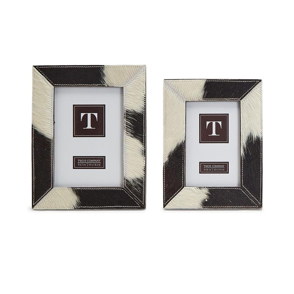 Two photo frames with cow print material 