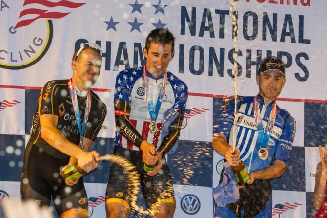 The men's podium cracks open the beer to celebrate.