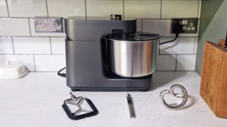 The Ooni Halo Pro Spiral mixer being tested in a green and white kitchen