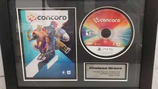 Photo of Concord wall plaque being auctioned by Goodwill