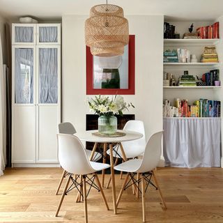 Kitchen diner with white IKEA larder cupboard