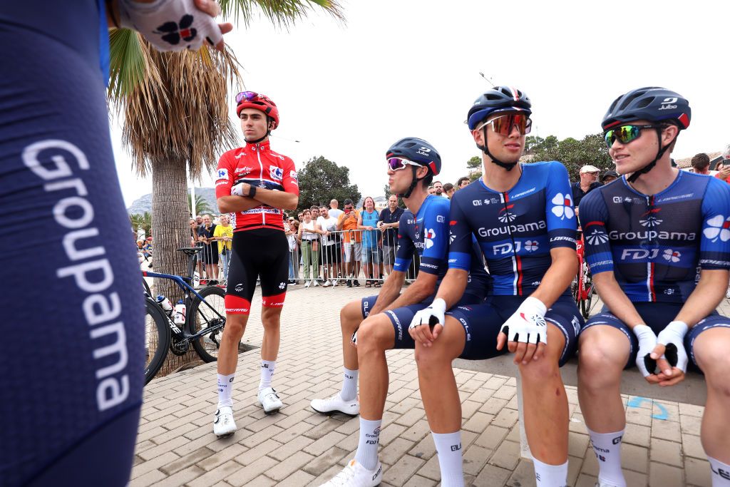 GC leader Lenny Martinez waits for the start of stage 8 with his Groupama-FDJ teammates