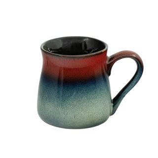 A red and blue stoneware coffee mug