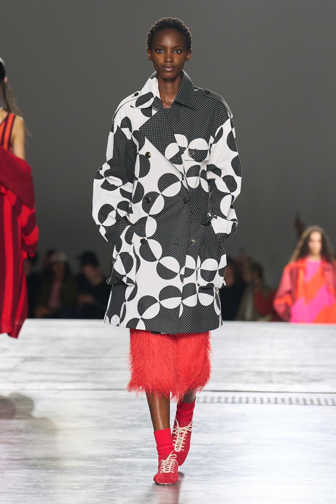 A red skirt on the Dries Van Noten runway.
