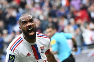 Alexandre Lacazette celebrates after scoring for Lyon against Montpellier in May 2023.