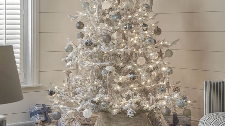 White Christmas Tree in a white living roomliving