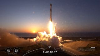 A SpaceX Falcon 9 rocket lifts off at sunset carrying 22 Starlink satellites from Vandenberg Space Force Base, California on April 6, 2024.