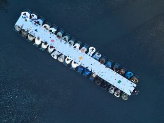 Aerial view of a table of people wearing Ermenegildo Zegna
