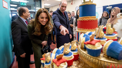 Prince William, Duke of Cambridge and Catherine, Duchess of Cambridge inspect cakes as they visit the Khidmat Centre on January 15, 2020 in Bradford, United Kingdom