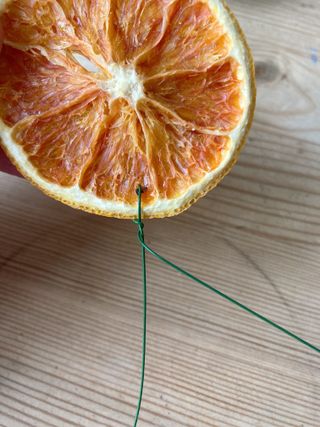 Christmas table centrepiece step by step, dried orange slice wired