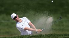 Ben Griffin hits a bunker shot during the 2025 Rocket Classic