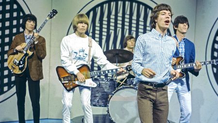 English rock group The Rolling Stones perform on the set of the ABC Television pop music television show Thank Your Lucky Stars at Alpha Television Studios in Birmingham, England on 30th January 1965. The band would play three songs on the show, Down Home Girl, Under the Boardwalk and Susie Q. Members of the group are, from left, Bill Wyman, Brian Jones (playing Gibson Firebird guitar), Charlie Watts, Mick Jagger and Keith Richards (playing Epiphone guitar). 