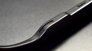 Close up of TCL RayNeo Air 2S AR smart glasses temple-housed open-ear speakers